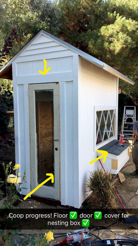 Chicken coop door, roof tiles, and partial paint job
